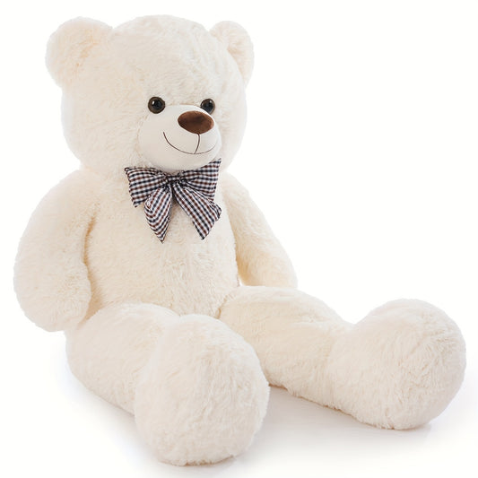 White teddy bear with a checkered bow tie on a white background
