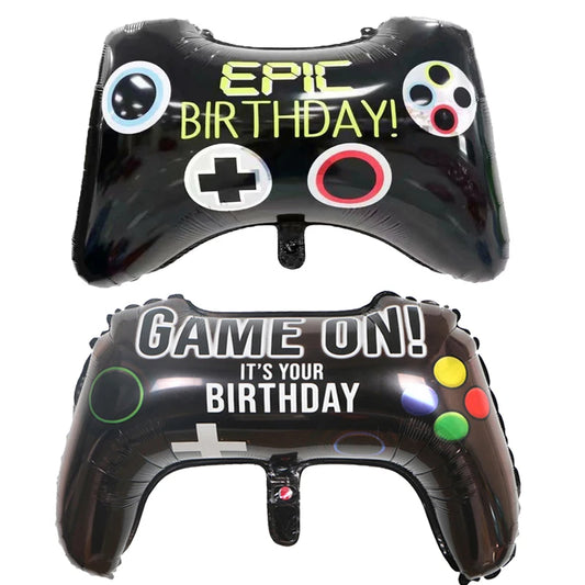 Two inflatable game controller balloons with birthday messages on a white background