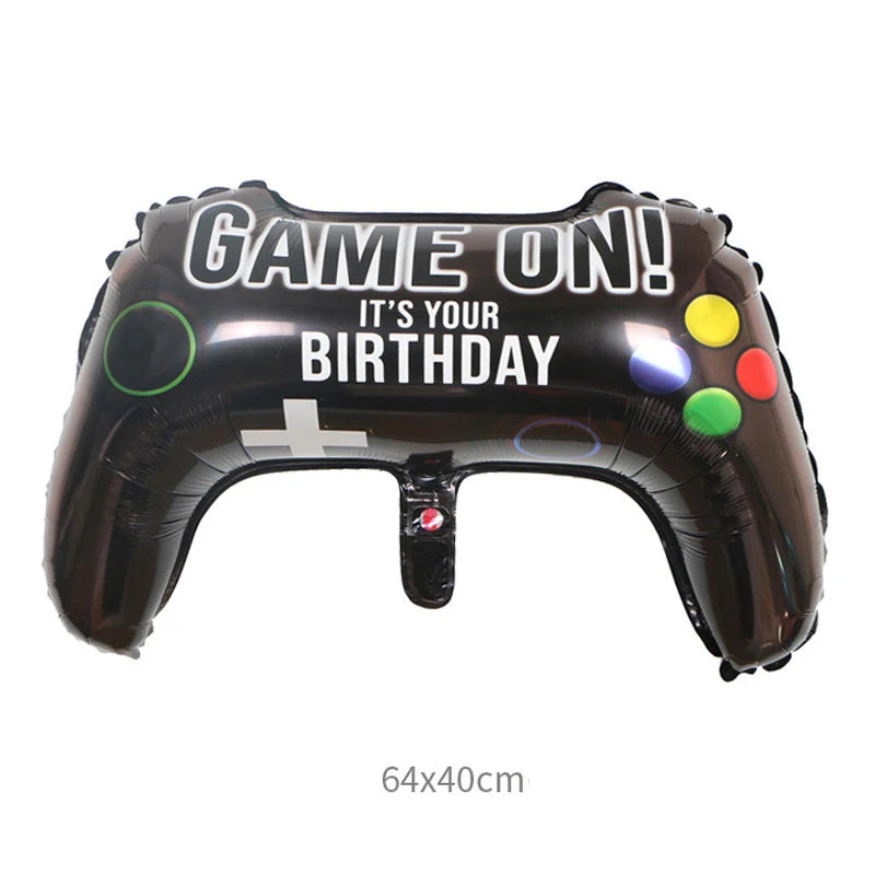 Black inflatable game controller balloon with 'Game On! It's Your Birthday' text on a white background