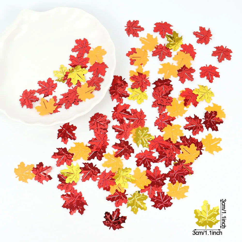 Red and yellow leaf-shaped confetti on a white plate with a leaf size indicator.