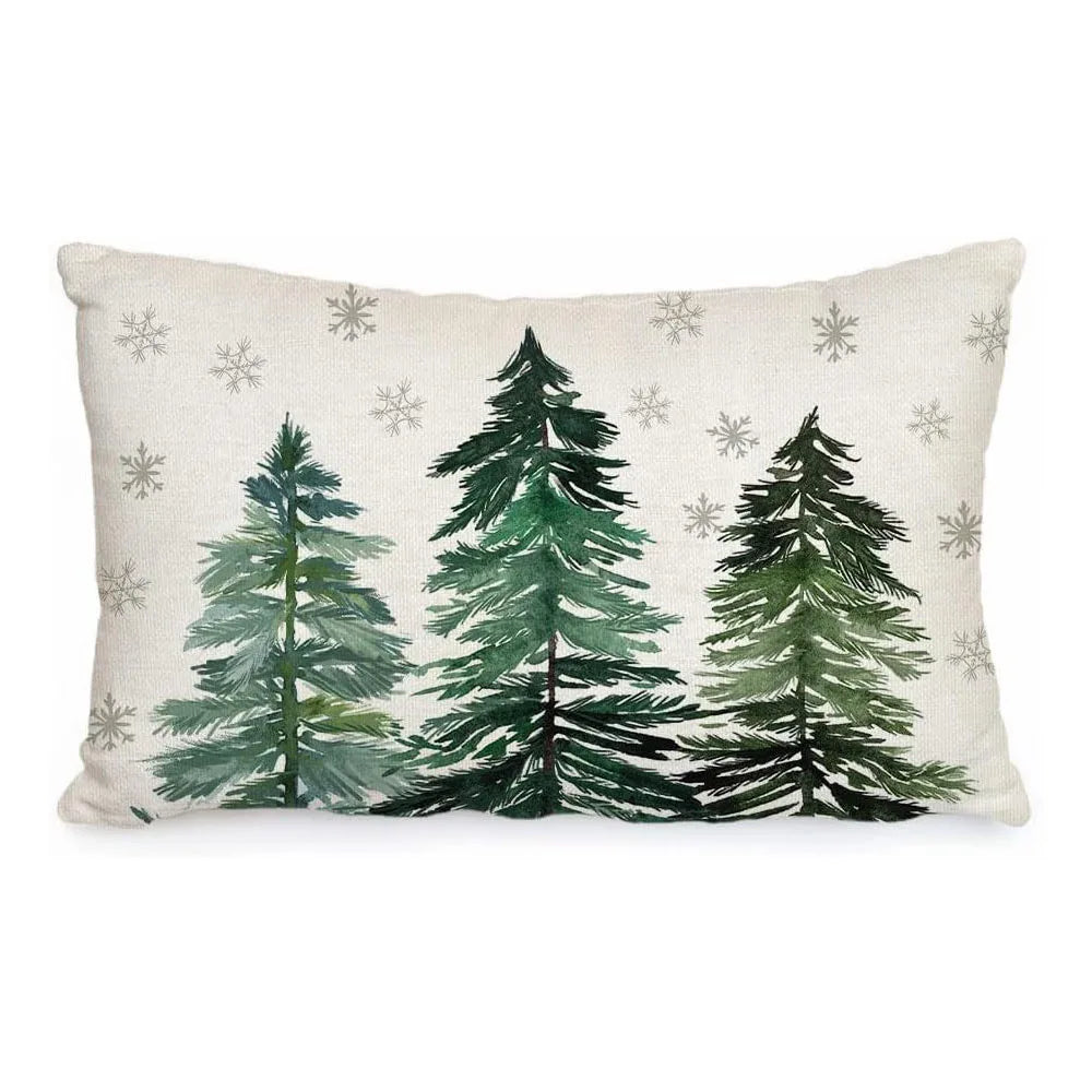 Decorative pillow with green trees and snowflakes on a white background