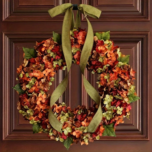 Decorative wreath with autumn colors on a wooden door