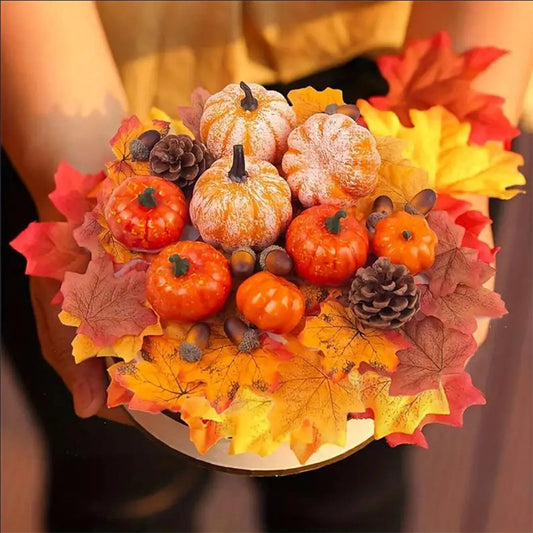 Decorative cake with pumpkins and autumn leaves on a blurred background