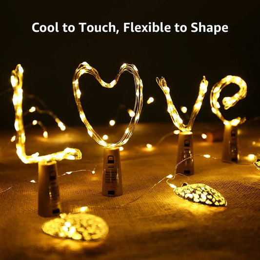 String lights shaped like the word 'LOVE' on a dark background with text 'Cool to Touch, Flexible to Shape'.