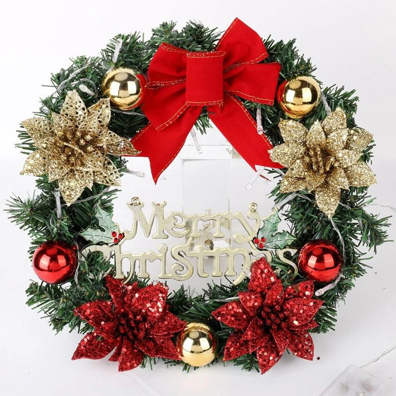 Christmas wreath with red and gold decorations on a white background