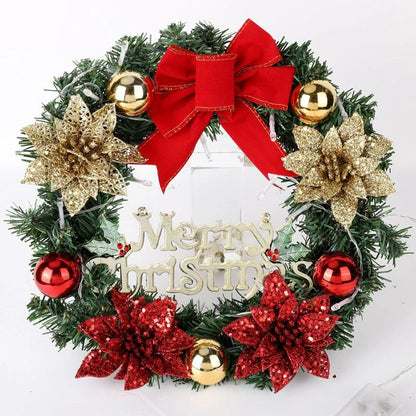 Christmas wreath with red and gold decorations on a white background