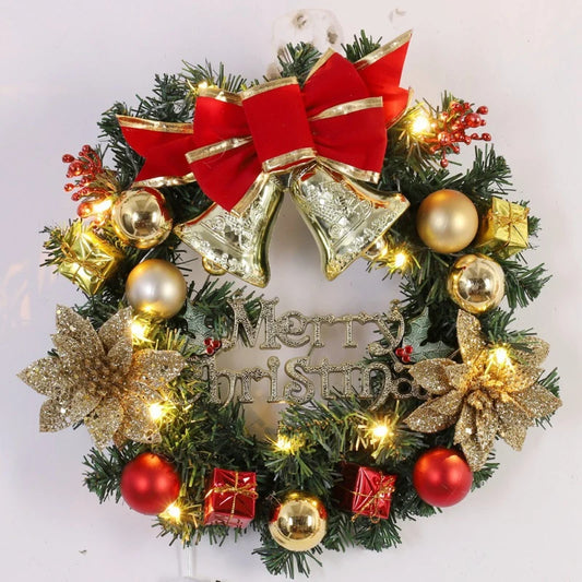 Decorative Christmas wreath with red and gold ornaments on a white background