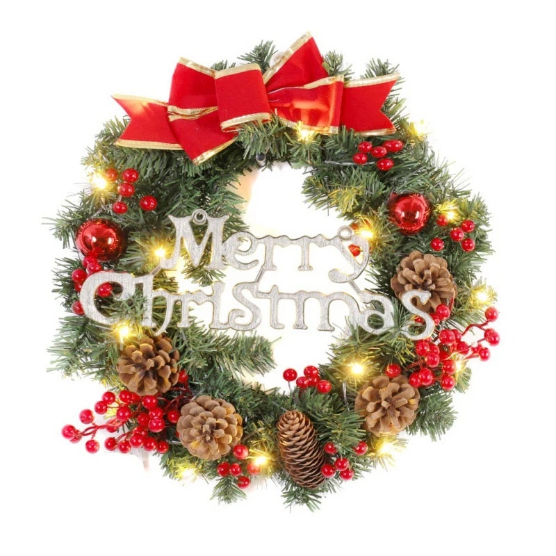 Christmas wreath with red ribbons, lights, pine cones, and berries on a white background