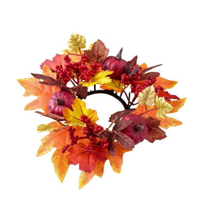 Decorative wreath with autumn leaves, pumpkins, and berries on a white background
