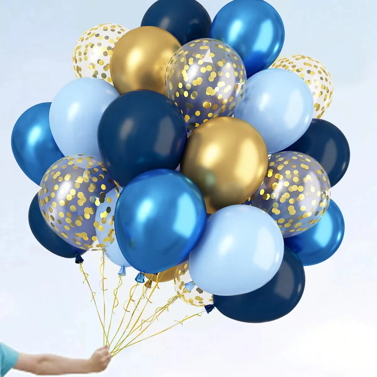 Bouquet of blue, gold, and white balloons with gold confetti on a light blue background