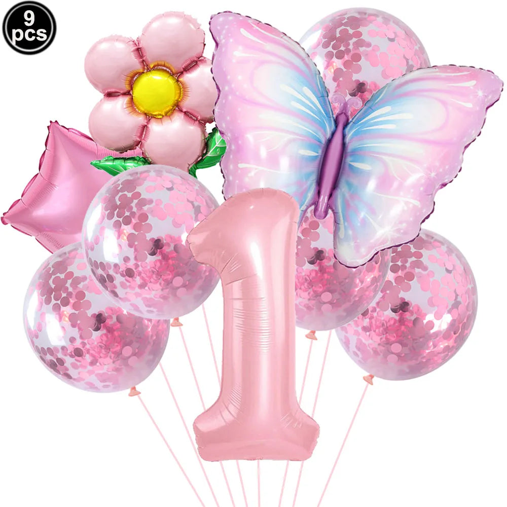 Set of pink balloons including a butterfly, flower, and number '1' on a white background