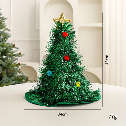 Small decorative Christmas tree with colorful ornaments on a white surface, with measurements displayed.