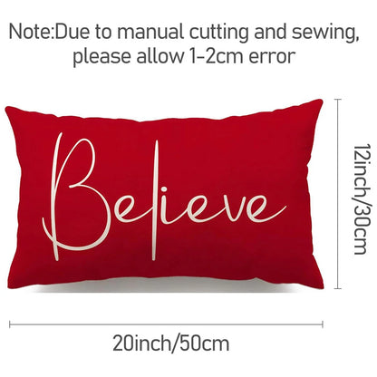 Red pillow with 'Believe' text and measurements on a white background