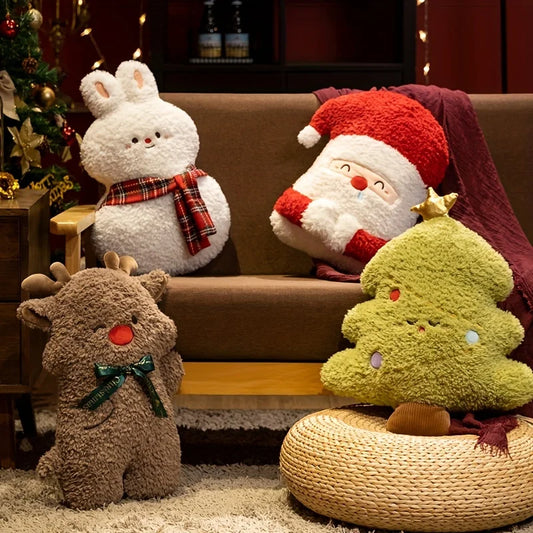 Four plush toys resembling a rabbit, Santa Claus, a reindeer, and a Christmas tree on a couch.