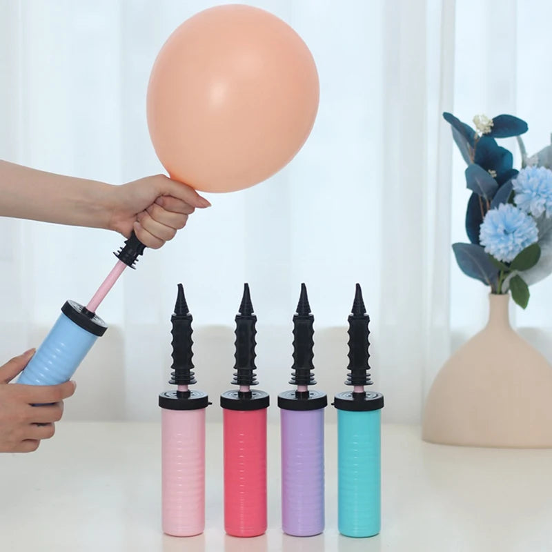 Colorful balloon inflators with a person inflating a balloon against a white background.