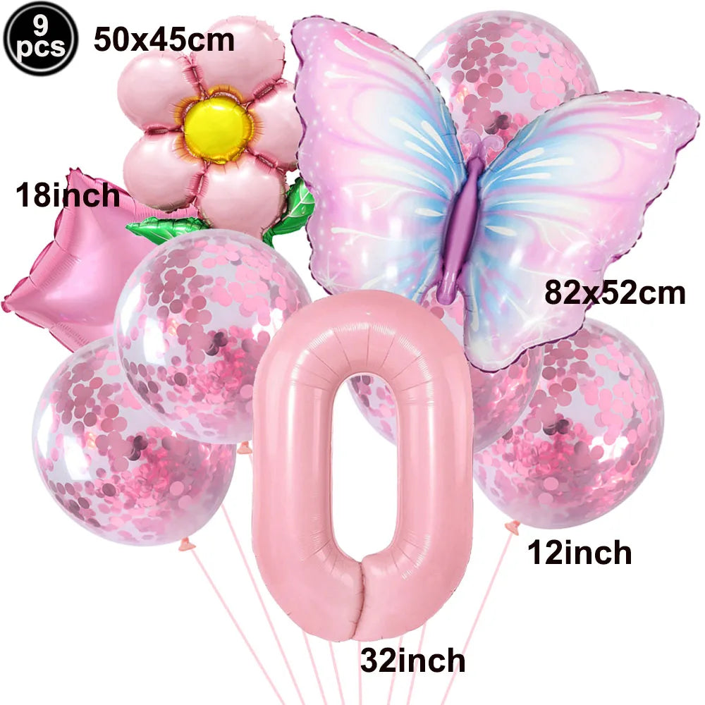 Set of pink balloons with butterfly and flower designs on a white background