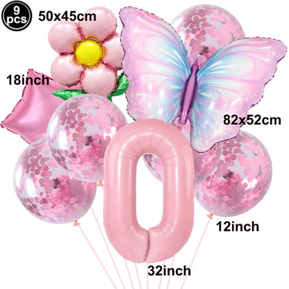 Set of pink balloons with butterfly and flower designs on a white background