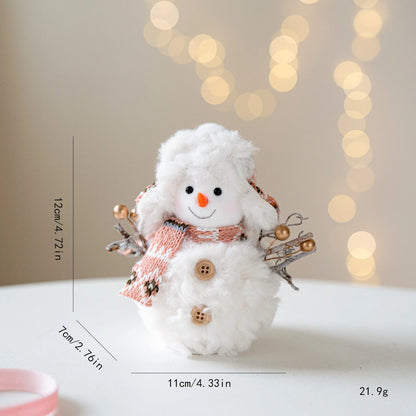 Decorative snowman figure with measurements and weight on a blurred background