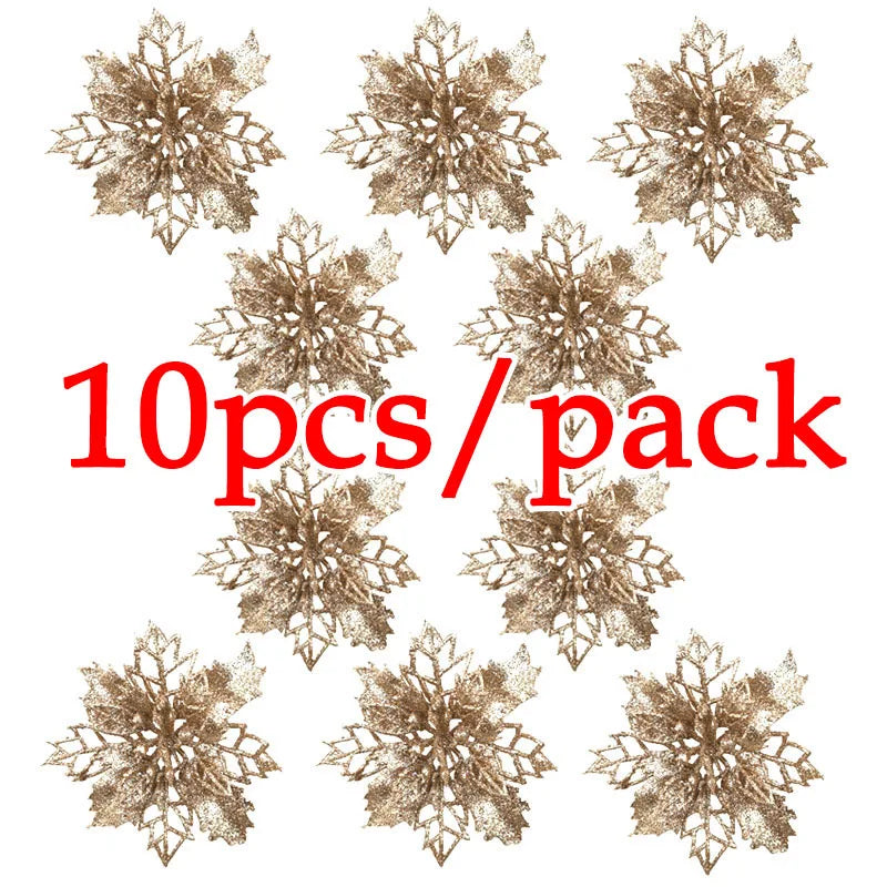 Gold snowflake decorations with '10pcs/pack' text on a white background