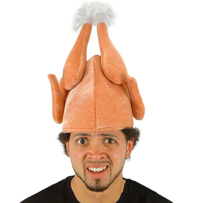 Person wearing a turkey hat on a white background