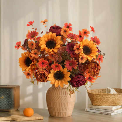 Bouquet of autumn flowers in a textured vase on a table with a neutral background