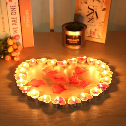 Decorative plate with floating candles and rose petals on a wooden surface