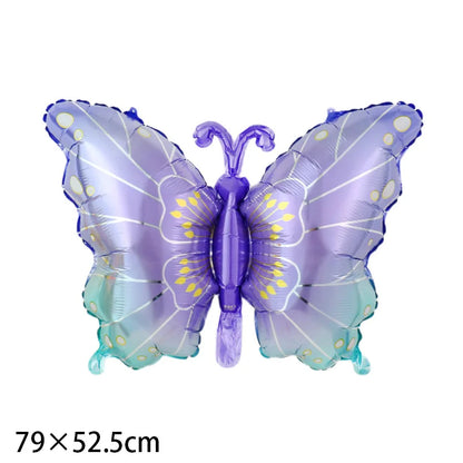 Butterfly-shaped balloon with purple and blue colors on a white background
