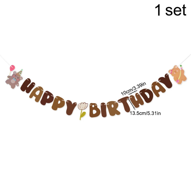 Happy Birthday banner with teddy bear and balloon decorations on a white background