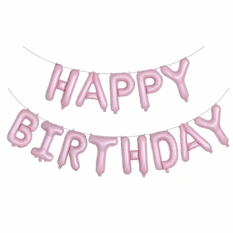 Pink 'Happy Birthday' balloon banner on a white background