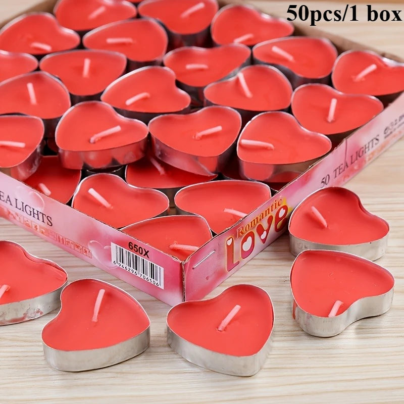 Heart-shaped red candles in a box labeled 'Romantic Love' with 50 candles per box.