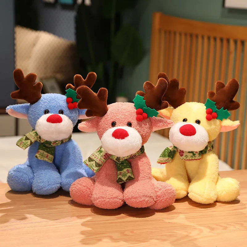 Three colorful plush reindeer toys on a wooden surface.