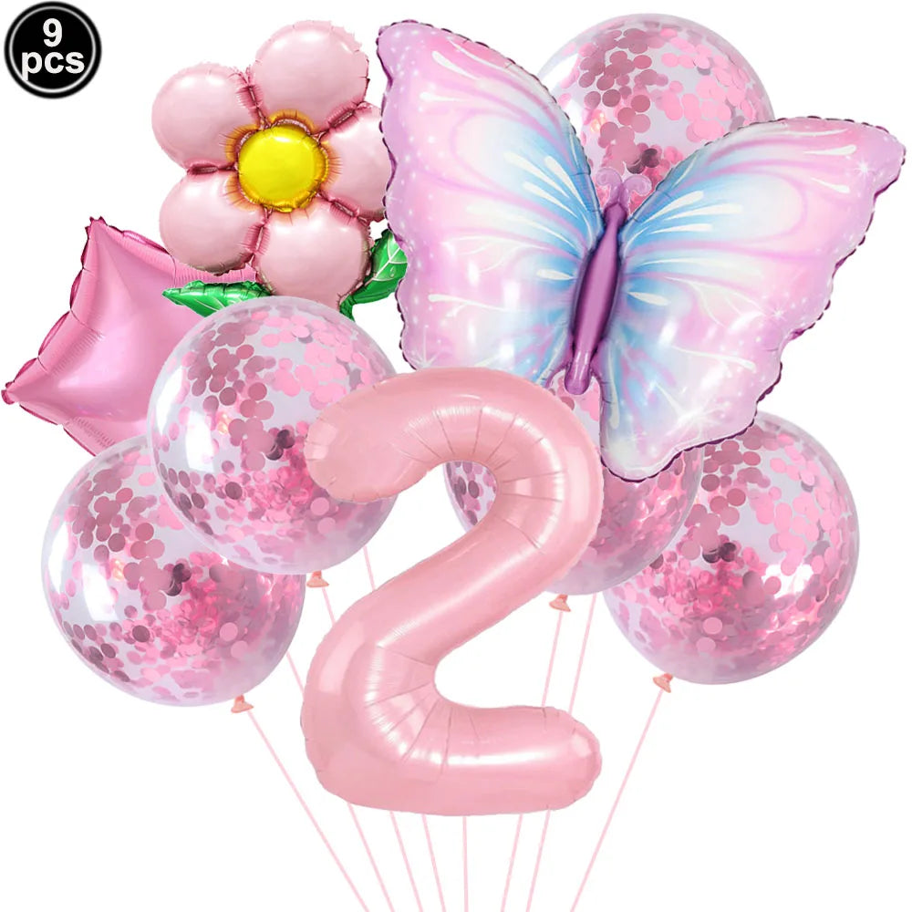 Set of pink balloons including a butterfly, number '2', and flower design on a white background.