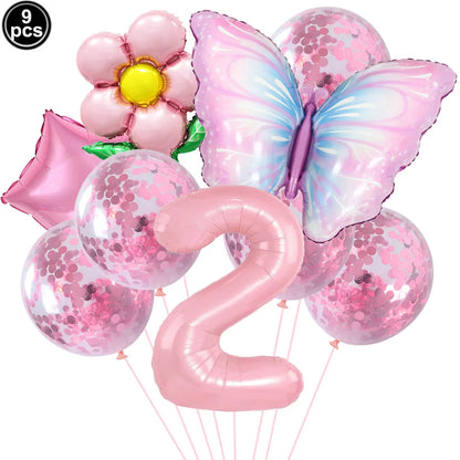 Set of pink balloons including a butterfly, number '2', and flower design on a white background.