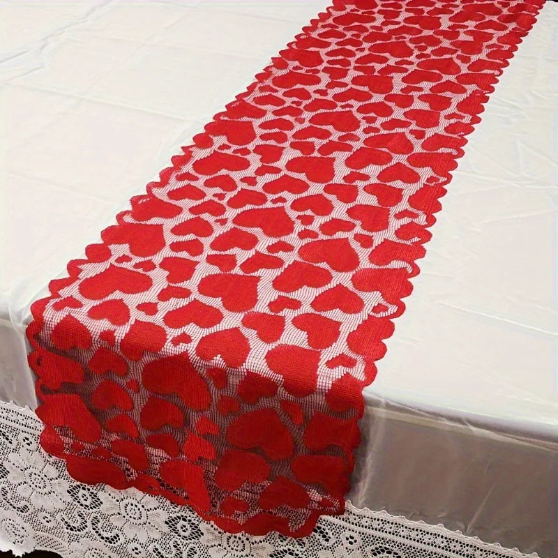 Red heart-patterned table runner on a white tablecloth