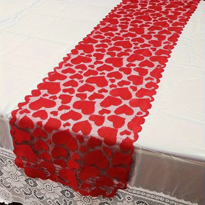 Red heart-patterned table runner on a white tablecloth