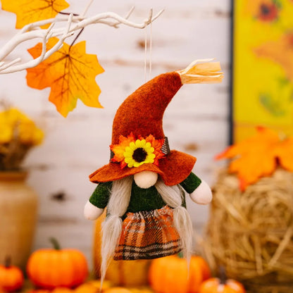 Decorative gnome with a sunflower hat in an autumn setting with pumpkins and leaves.