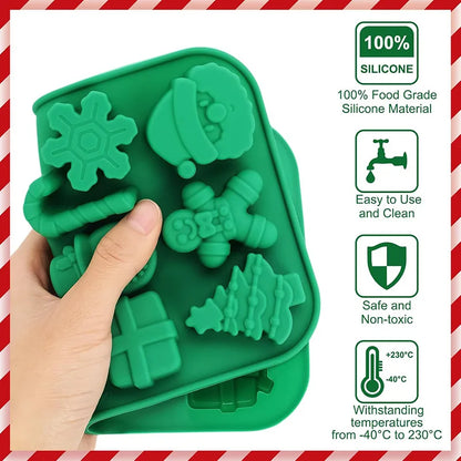 Green silicone mold with Christmas-themed shapes held by a hand, against a white background with red and white striped border.