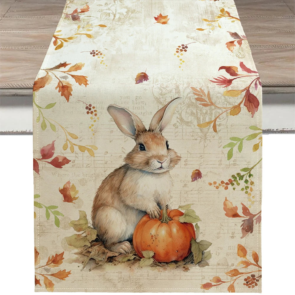 Table runner with a rabbit and pumpkin design on a floral background