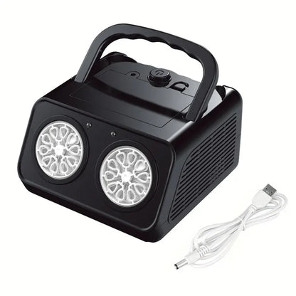 Black fog machine with two circular lights and a USB cable on a white background