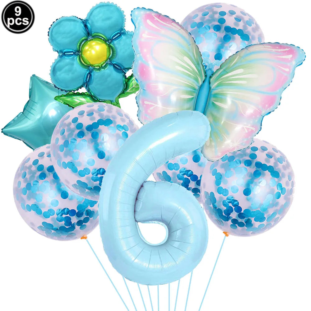Set of colorful balloons including a butterfly, number 6, and flower on a white background