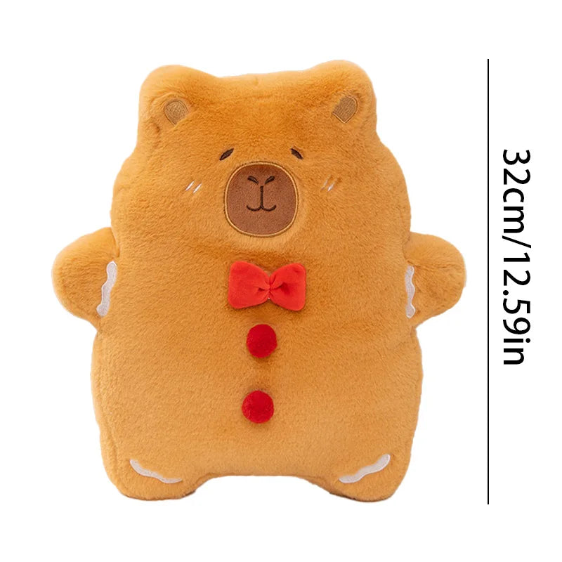 Plush capybara toy with a red bow tie and buttons on a white background
