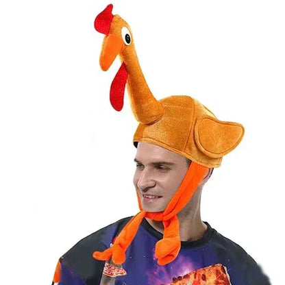Person wearing a turkey hat with a red comb on a white background