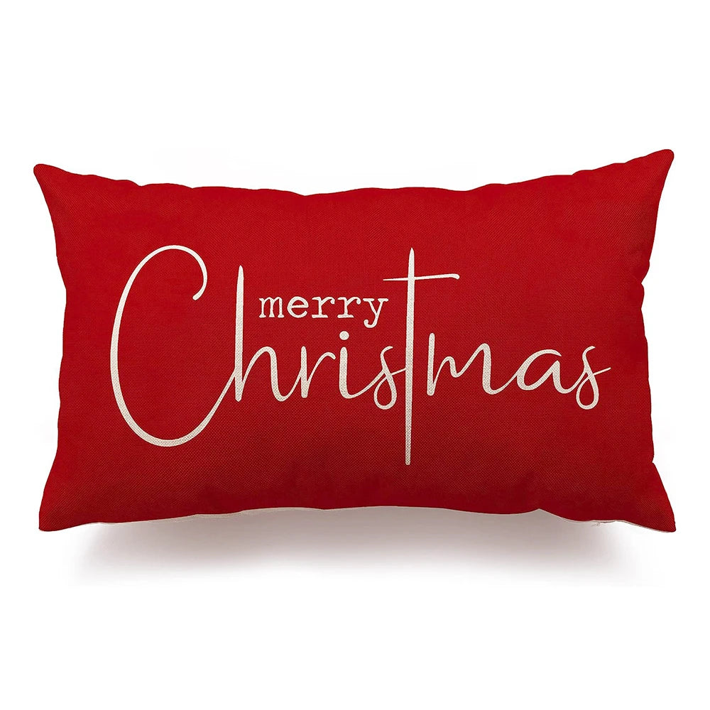 Red pillow with 'Merry Christmas' text on a white background