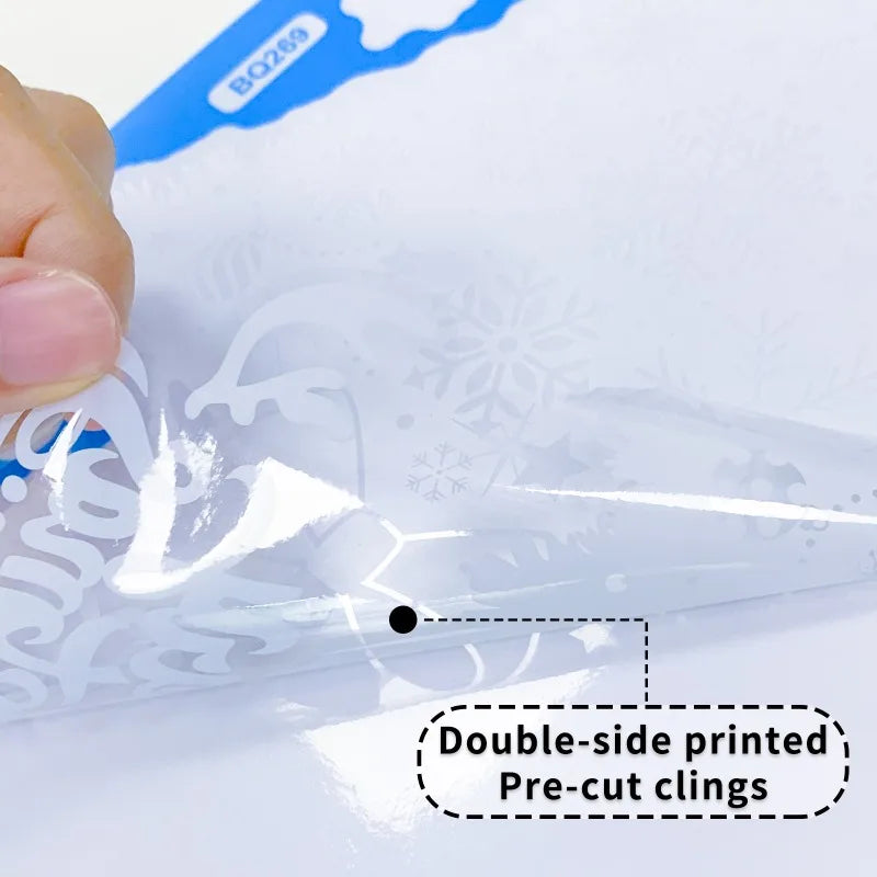 Hand holding a sheet of double-sided printed pre-cut clings with a visible brand label.