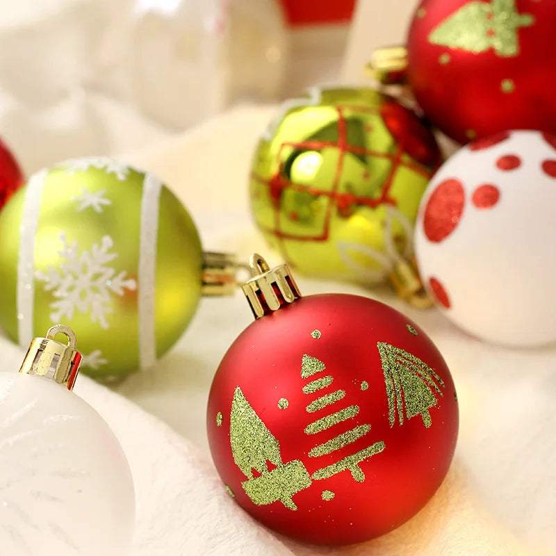 Close-up of Christmas ornaments with red, green, and white designs on a soft background.