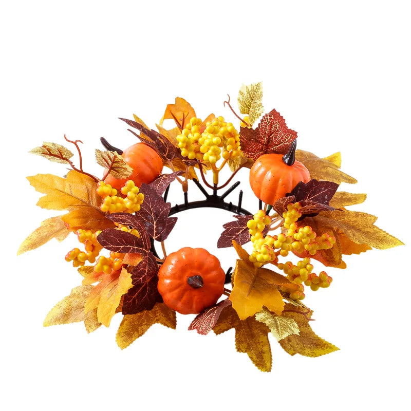 Decorative wreath with pumpkins and autumn leaves on a white background
