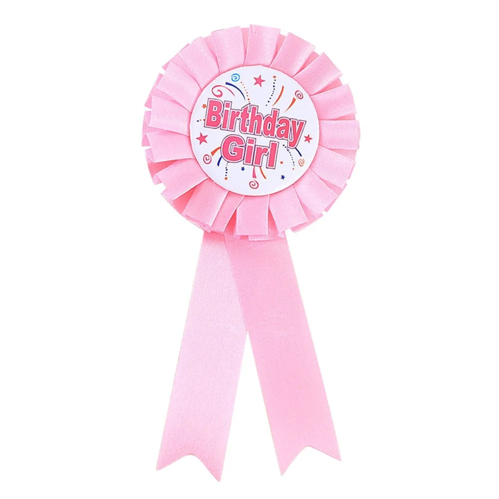 Pink 'Birthday Girl' ribbon award on a white background