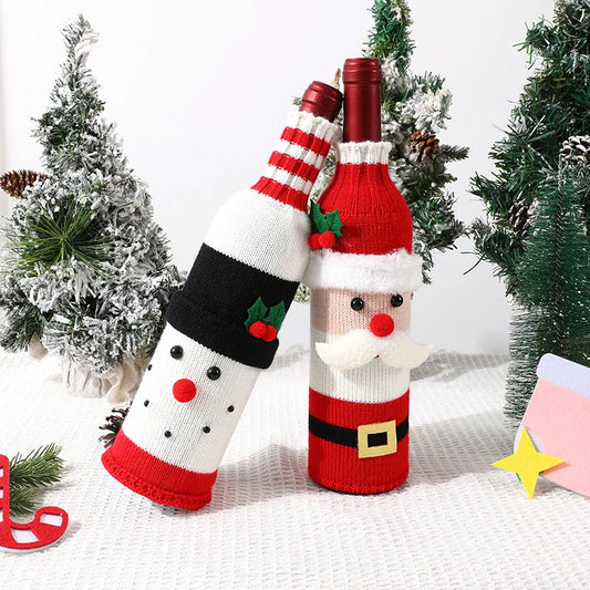 Two wine bottle covers, one shaped like a snowman and the other like Santa Claus, with Christmas trees in the background.