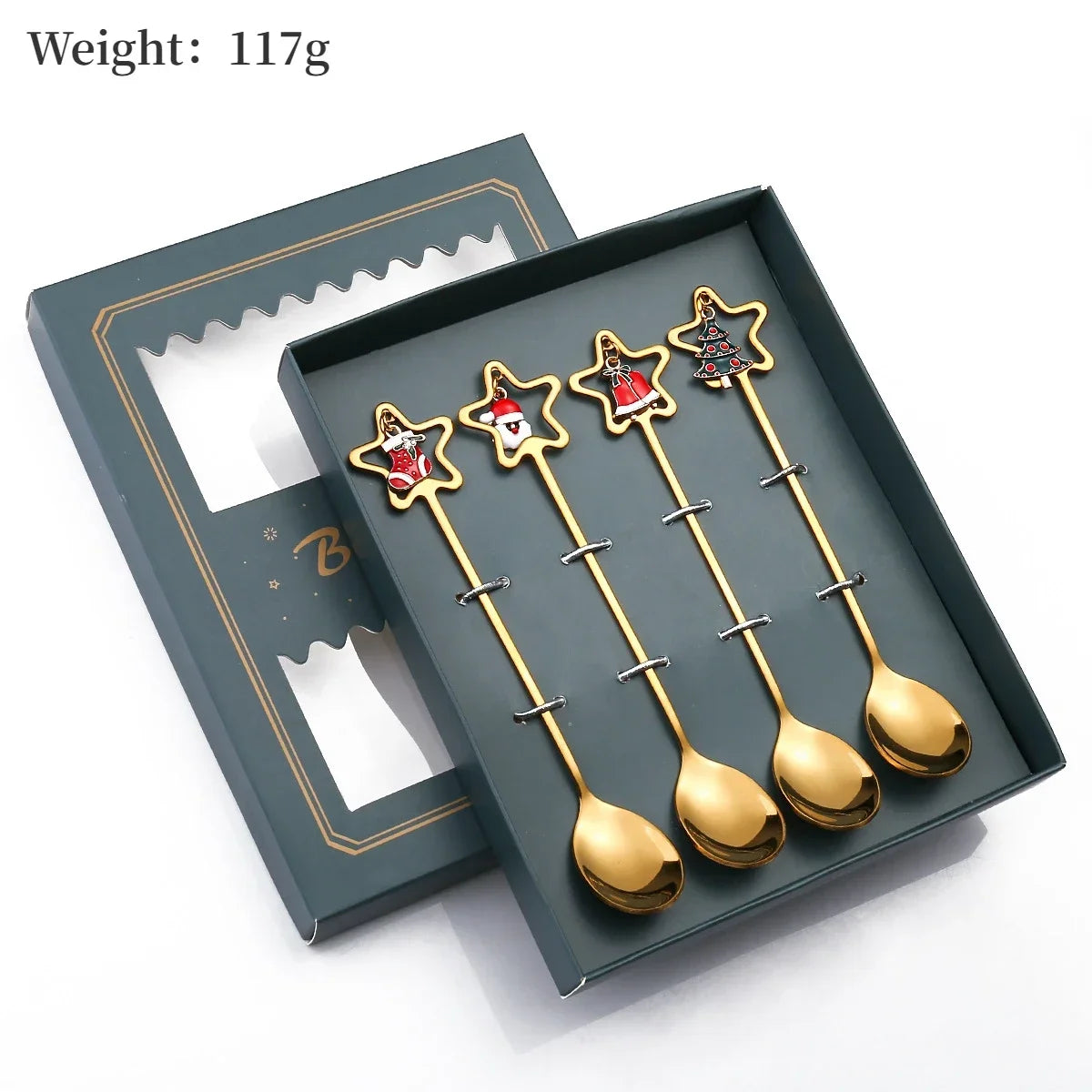 Set of gold star-shaped spoons in a green box with weight information.