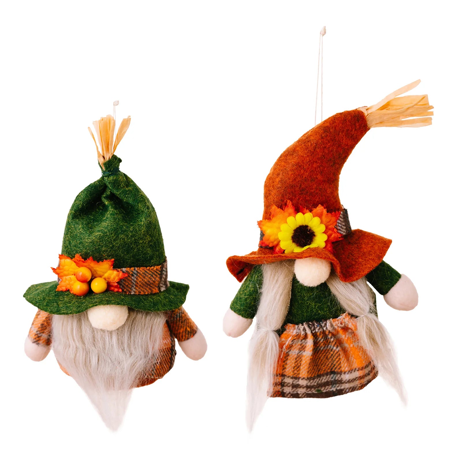 Two decorative gnomes with autumn-themed hats on a white background